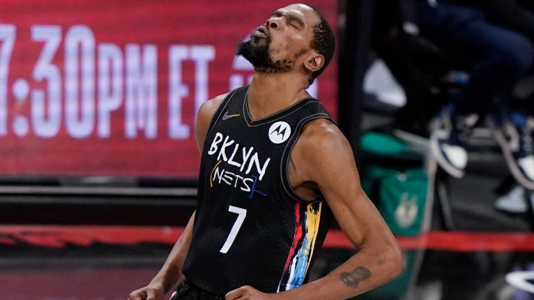 Brooklyn Nets forward Kevin Durant reacts after sinking a 3-point shot against the Milwaukee Bucks during the fourth quarter of Game 5 of a second-round NBA basketball playoff series Tuesday, June 15, 2021, in New York. (Kathy Willens/AP) 