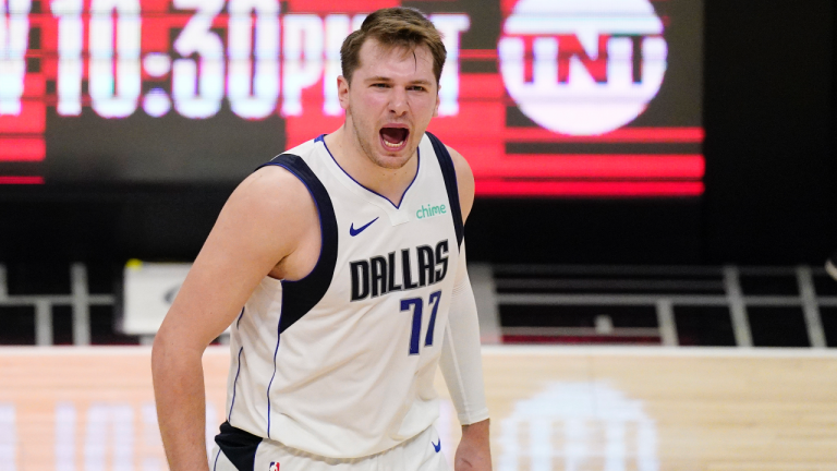 Dallas Mavericks guard Luka Doncic celebrates. (Mark J. Terrill / AP) 