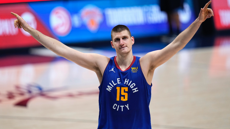 Denver Nuggets centre Nikola Jokic (15) celebrate the team's double-overtime win against the Portland Trail Blazers in Game 5 of a first-round NBA basketball playoff series Tuesday, June 1, 2021, in Denver. (Jack Dempsey / AP) 