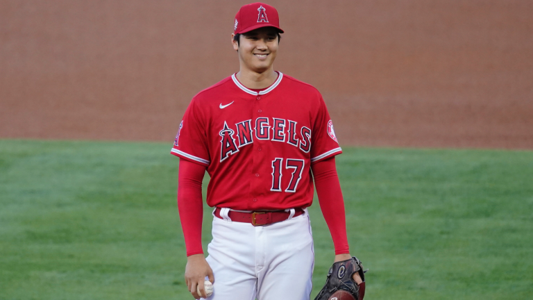 Los Angeles Angels starting pitcher Shohei Ohtani (17) smiles as he stands on the mound before a baseball game against the Seattle Mariners Friday, June 4, 2021, in Anaheim, Calif. (Ashley Landis / AP) 