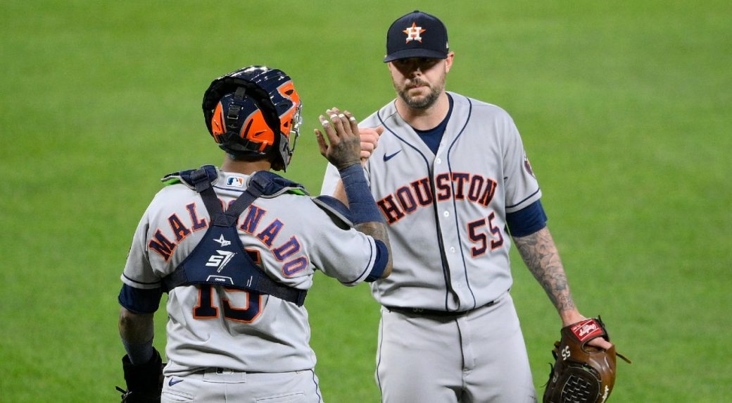 Houston Astros pitcher Ryan Pressly (55) celebrates with catcher