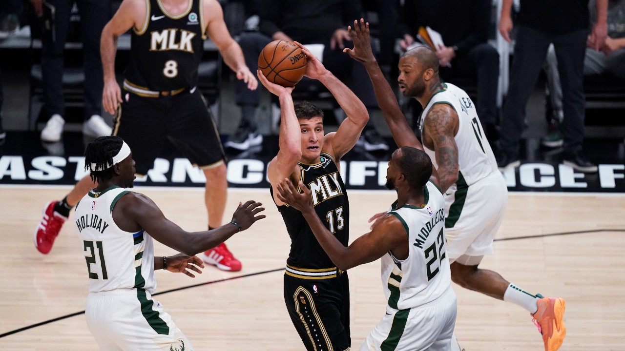 Hawks romp to Game 4 win without Young, Giannis goes down