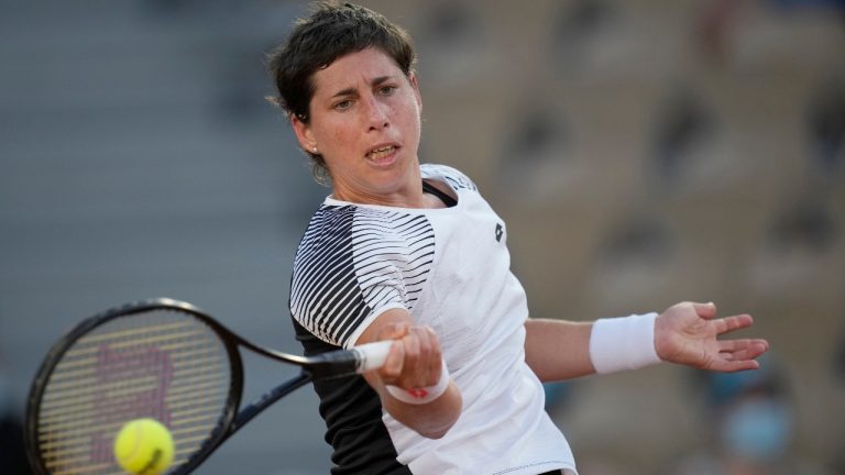 Spain's Carla Suarez Navarro plays a return to United States's Sloane Stephens during their first round match on day three of the French Open tennis tournament at Roland Garros in Paris, France, Tuesday, June 1, 2021. (Christophe Ena/AP)