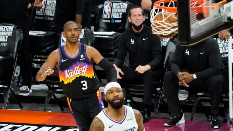 Phoenix Suns guard Chris Paul (3) watches his shot go through the hoop as Los Angeles Clippers forward Marcus Morris Sr. (8) looks on during the first half of game 5 of the NBA basketball Western Conference Finals, Monday, June 28, 2021, in Phoenix. (Matt York/AP)