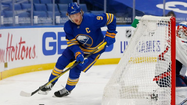 Buffalo Sabres forward Jack Eichel carries the puck during the second period of the team's NHL hockey game against the Washington Capitals, Friday, Jan. 15, 2021, in Buffalo, N.Y. (Jeffrey T. Barnes/AP) 