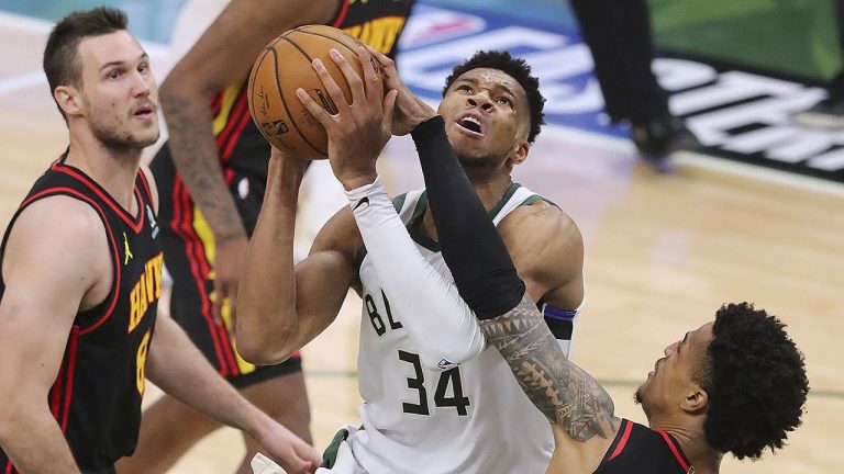 Milwaukee Bucks forward Giannis Antetokounmpo drives to the basket during Game 2 in the NBA Eastern Conference Finals. (Curtis Compton/Atlanta Journal-Constitution via AP)