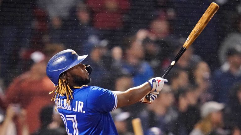 Toronto Blue Jays designated hitter Vladimir Guerrero Jr. watches his solo home run, tying the game at 1-1, in the top of the ninth inning of a baseball game against the Boston Red Sox at Fenway Park, Monday, June 14, 2021, in Boston. (Charles Krupa/AP)