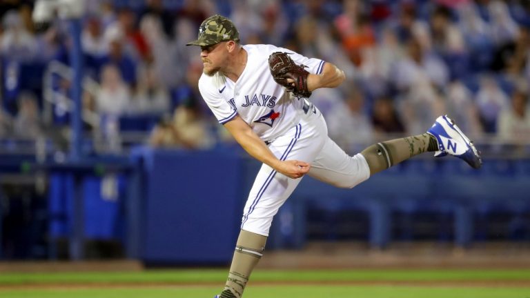 Toronto Blue Jays relief pitcher Jeremy Beasley throws against the Philadelphia Phillies during his Blue Jays debut in the seventh inning of a baseball game Friday, May 14, 2021, in Dunedin, Fla. (Mike Carlson/AP) 