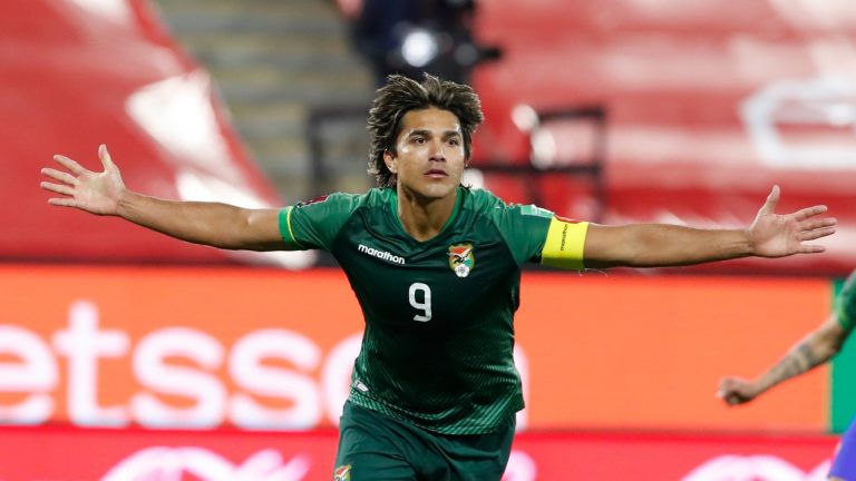 Bolivia's Marcelo Martins celebrates after scoring his side's first goal against Chile on a penalty kick during a qualifying soccer match for the FIFA World Cup Qatar 2022 in Santiago, Chile, Tuesday, June 8, 2021. (Alberto Valdez/ Pool via AP)