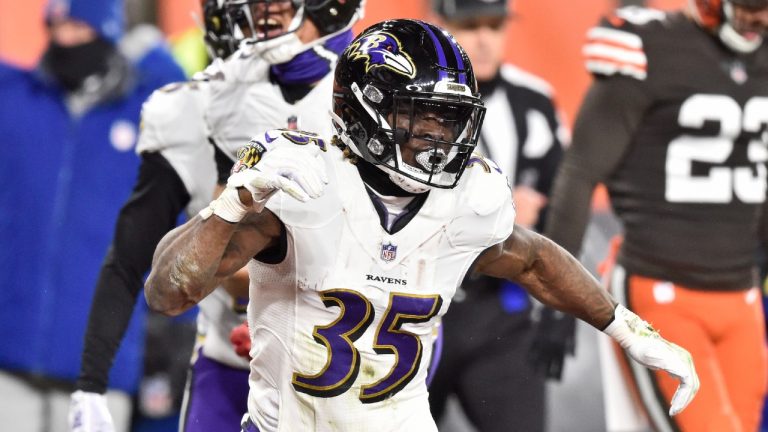 Baltimore Ravens running back Gus Edwards (35) celebrates after scoring an 11-yard touchdown during the first half of an NFL football game against the Cleveland Browns, Monday, Dec. 14, 2020, in Cleveland. (David Richard/AP) 