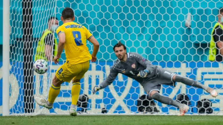 Ukraine's Ruslan Malinovskyi kicks and misses to score a penalty shot during the Euro 2020 soccer championship group C match between Ukraine and North Macedonia at the National Arena stadium in Bucharest, Romania, Thursday, June 17, 2021. (Vadim Ghirda/AP) 