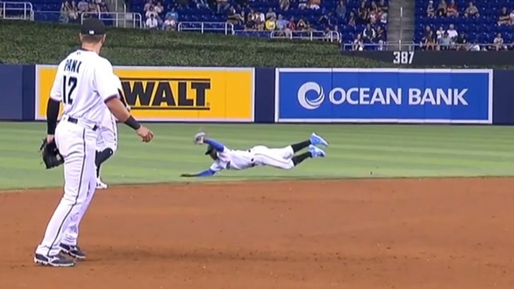 Chas McCormick lays out for the catch and Vladdy stretches at first