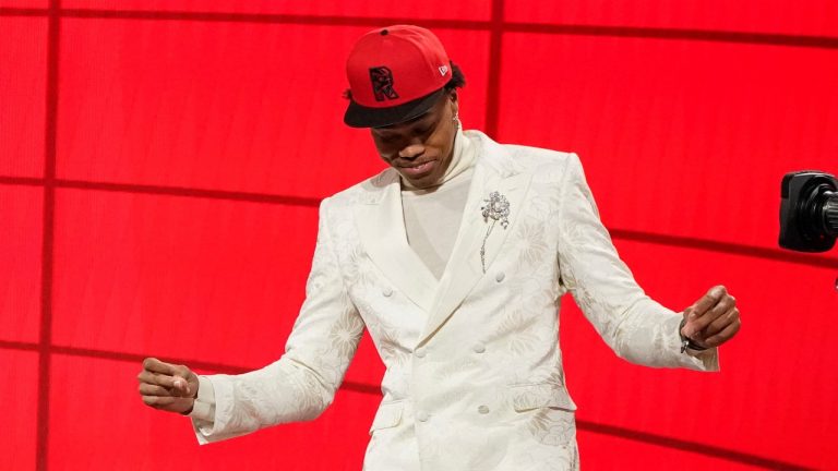 Scottie Barnes reacts after being selected fourth overall by the Toronto Raptors during the first round of the NBA basketball draft, Thursday, July 29, 2021, in New York. (AP Photo/Corey Sipkin) 
