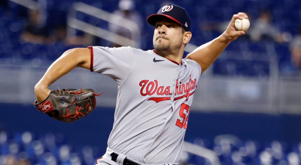 Blue Jays acquire closer Brad Hand from Nationals for Riley Adams