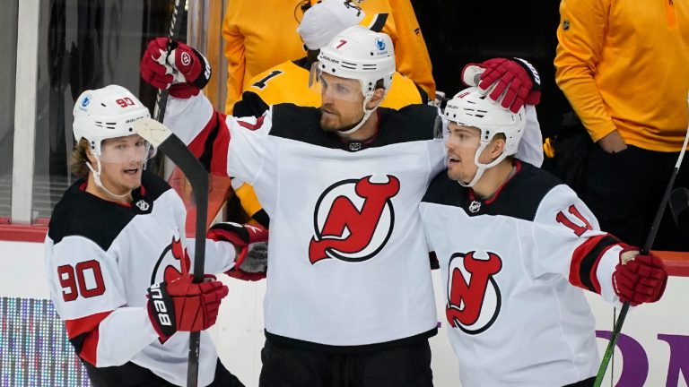 New Jersey Devils' Matt Tennyson (7) celebrates his goal during the first period of the team's NHL hockey game against the Pittsburgh Penguins in Pittsburgh, Thursday, April 22, 2021. (AP Photo/Gene J. Puskar) 