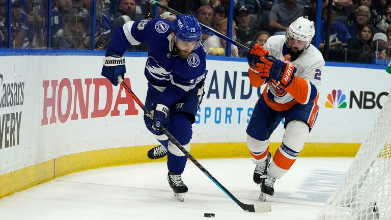 Tampa Bay Lightning center Barclay Goodrow, left, moves past New York Islanders defenseman Nick Leddy (2) during the second period in Game 5 of an NHL hockey Stanley Cup semifinal playoff series Monday, June 21, 2021, in Tampa, Fla. (Chris O'Meara/AP) 