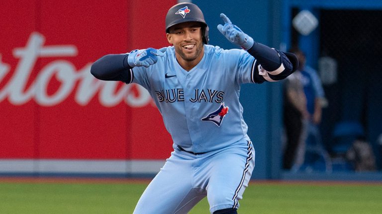 Toronto Blue Jays centre fielder George Springer celebrates his RBI double against the Kansas City Royals on July 30, 2021. (Peter Power/CP)