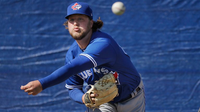 Toronto Blue Jays' Kirby Snead delivers a pitch during a spring training baseball workout Sunday, Feb. 16, 2020. (Frank Franklin II/AP)