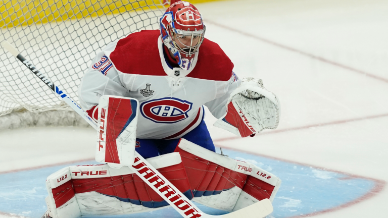 Montreal Canadiens goaltender Carey Price warms up before the first period in Game 2 of the NHL hockey Stanley Cup finals against the Tampa Bay Lightning, Wednesday, June 30, 2021, in Tampa, Fla. (Gerry Broome / AP) 