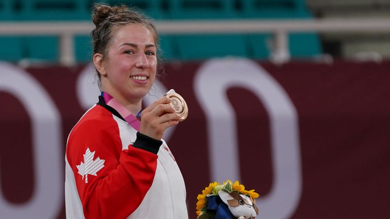 Catherine Beauchemin-Pinard of Canada poses with her bronze medal in the Women Judo 63kg during the Tokyo Olympics in Tokyo. (Nathan Denette/CP)