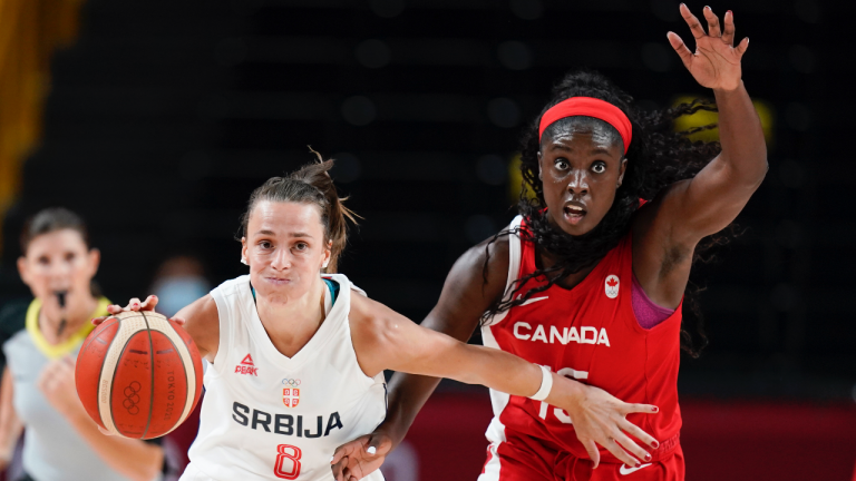 Serbia's Nevena Jovanovic (8) drives up court ahead of Canada's Laeticia Amihere during a women's basketball preliminary round game at the 2020 Summer Olympics, Monday, July 26, 2021, in Saitama, Japan. (Charlie Neibergall / AP) 