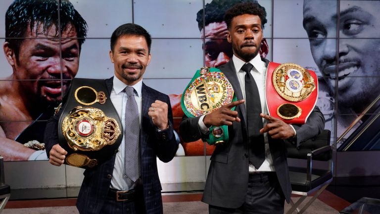 Manny Pacquiao, left, and Errol Spence Jr., pose for a photo. (Damian Dovarganes/AP) 