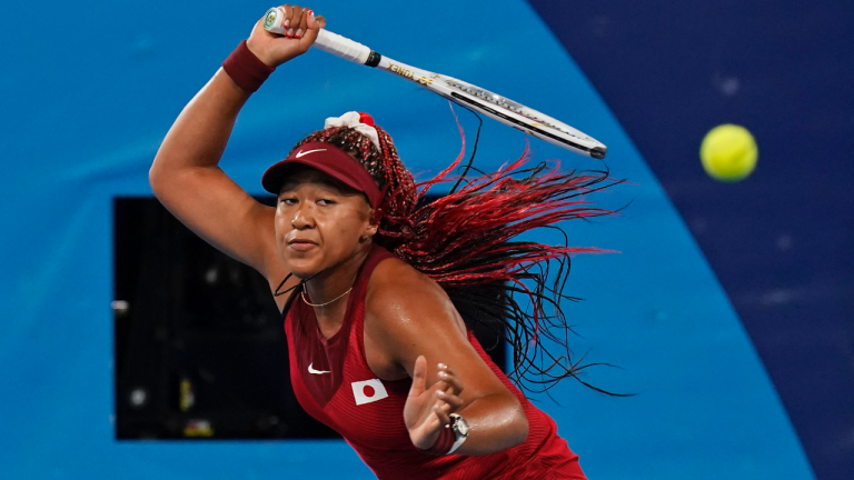 Naomi Osaka, of Japan, plays Marketa Vondrousova, of the Czech Republic, during the third round of the tennis competition at the 2020 Summer Olympics, Tuesday, July 27, 2021, in Tokyo, Japan. (Seth Wenig / AP) 