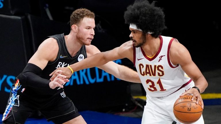 Brooklyn Nets' Blake Griffin, left, defends against Cleveland Cavaliers' Jarrett Allen. (Frank Franklin II/AP) 