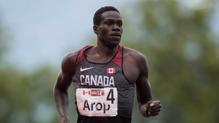 Marco Arop, of Edmonton, races to a first-place finish in the men's 800 metre race at the Harry Jerome International Track Classic, in Burnaby, B.C., on Wednesday, June 27, 2018. (Darryl Dyck/CP)