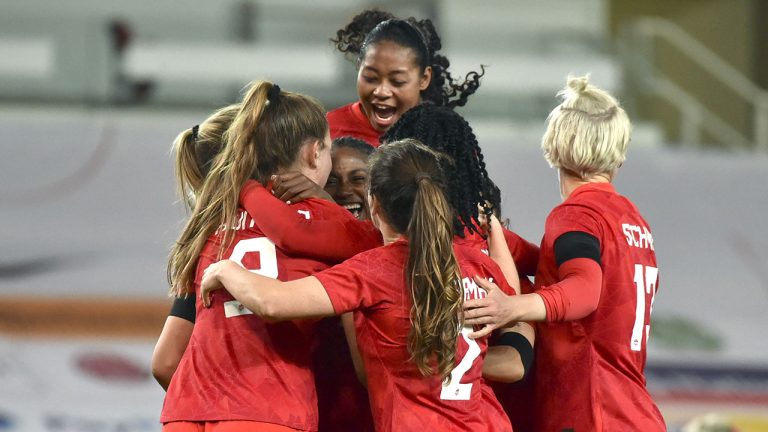 Canada players celebrate their second goal against England during an international friendly soccer match on April 13, 2021. (AP Photo/Rui Vieira)