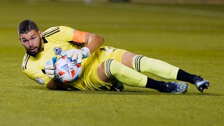 Vancouver Whitecaps goalkeeper Maxime Crepeau (16) makes a save against the Los Angeles Galaxy in the second half during an MLS soccer match Wednesday, June 23, 2021, in Sandy, Utah. (Rick Bowmer/AP) 