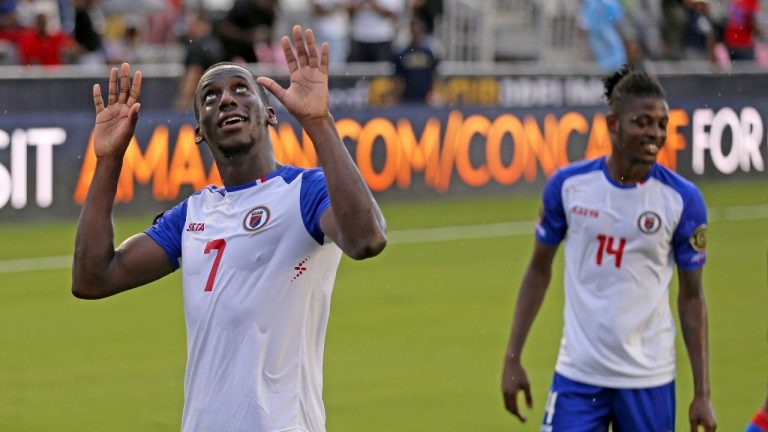 Haiti's Carnejy Antoine (7) celebrates a late score in the second half against Saint Vincent and the Grenadines during a CONCACAF Gold Cup soccer qualifying match in Fort Lauderdale, Fla., Friday, July 2, 2021. (Charles Trainor Jr./Miami Herald via AP) 