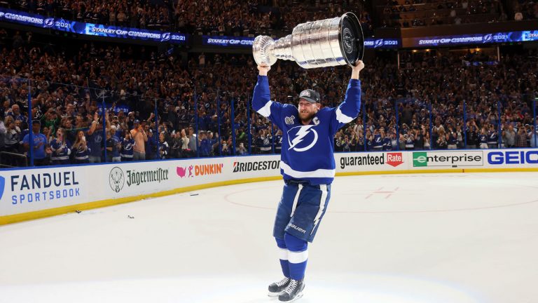 Tampa Bay Lightning's Steven Stamkos hoists the Stanley Cup after the team's 1-0 victory against the Montreal Canadiens in Game 5 of the NHL hockey Stanley Cup Finals. (Bruce Bennett/AP)