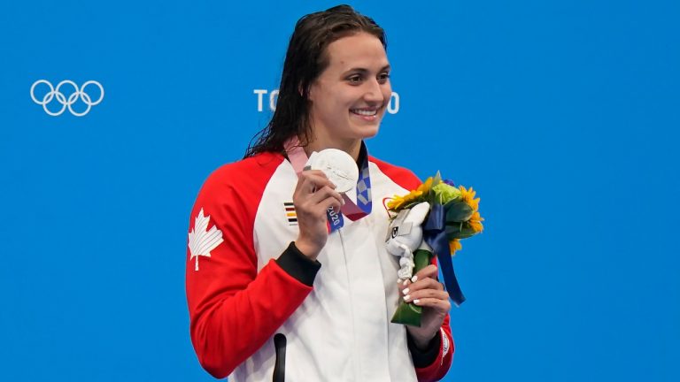 Canada's Kylie Masse celebrates a silver medal in the women's 200m backstroke final during the Tokyo Summer Olympic Games, in Tokyo, Saturday, July 31, 2021. (Adrian Wyld/CP)