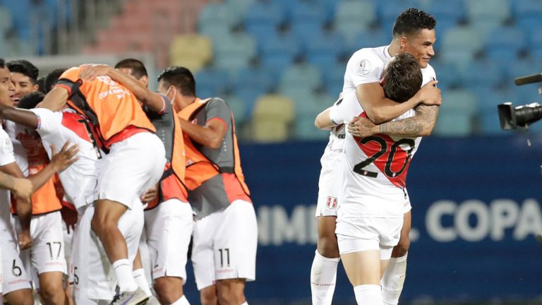 Peru's players celebrate defeating Paraguay 4-3 in a penalty shootout during a Copa America quarterfinal soccer match at the Olimpico stadium in Goiania, Brazil. (Eraldo Peres/AP)