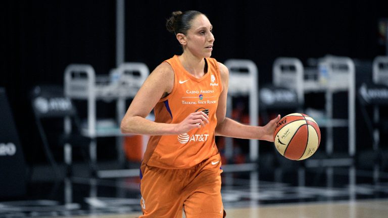 Phoenix Mercury guard Diana Taurasi sets up a play during the second half of a WNBA basketball first round playoff game against the Washington Mystics in Bradenton, Fla., in this Tuesday, Sept. 15, 2020. (Phelan M. Ebenhack/AP) 