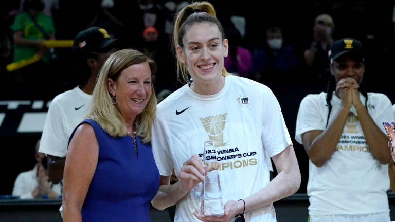 Seattle Storm forward Breanna Stewart holds the MVP trophy after the Commissioner's Cup WNBA basketball game against the Connecticut Sun, Thursday, Aug. 12, 2021, in Phoenix. (Matt York / AP) 