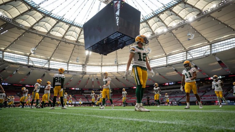 Edmonton Elks players warm up before a CFL football game against the B.C. Lions in Vancouver, on Thursday August 19, 2021 (Darryl Dyck/CP). 