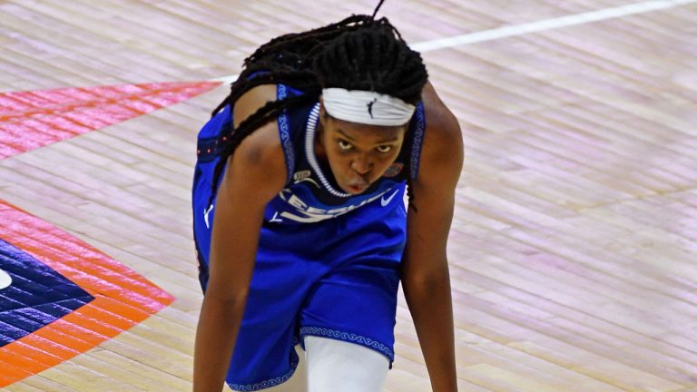 Connecticut Sun forward Jonquel Jones celebrates after hitting a 3-pointer against the New York Liberty during a WNBA basketball game Saturday. (Sean D. Elliot/AP) 