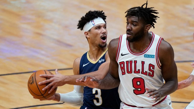 New Orleans Pelicans guard Josh Hart (3) drives to the basket against Chicago Bulls forward Patrick Williams (9) during the first half of an NBA basketball game (Gerald Herbert/AP).