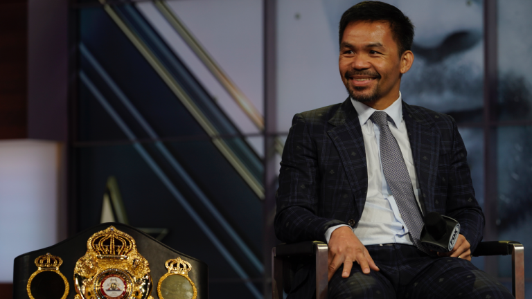 Manny Pacquiao smiles during a news conference with Errol Spence Jr. at the Fox Studios lot in Los Angeles ahead of their upcoming boxing match, taking place in Las Vegas on Aug. 21, in Los Angeles, Sunday, Jul. 11, 2021. (Damian Dovarganes / AP) 