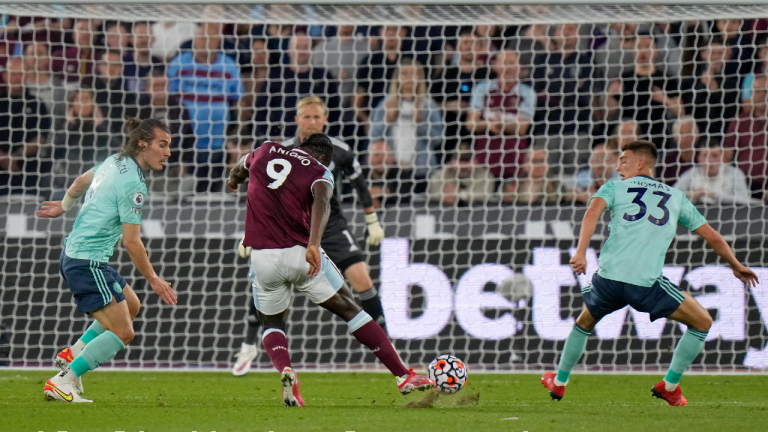 West Ham's Michail Antonio, centre, takes a shot during a Premier League match between West Ham United and Leicester City. (Alastair Grant/AP)