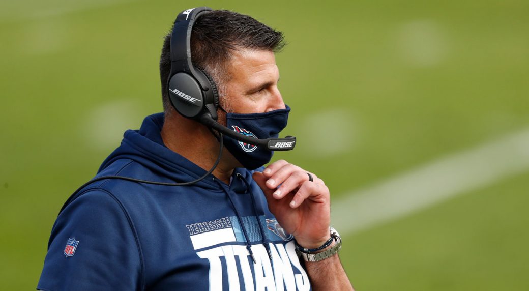 Tennessee Titans coach Mike Vrabel walks out of Friday's press