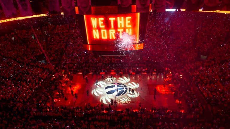 The court is illuminated at Scotiabank Arena ahead of an NBA Finals game. (Chris Young/The Canadian Press via AP)