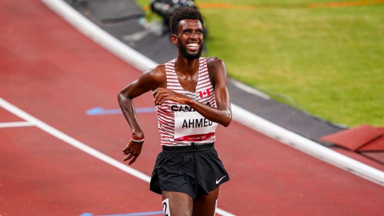 Canadian distance runner Mohammed Ahmed competes in the first round of heats in the Men's 5000m during the Tokyo Summer Olympic Games, Tuesday, Aug. 3, 2021. (Stephen Hosier/HO/COC/CP)