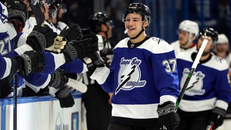 Tampa Bay Lightning center Yanni Gourde (37) celebrates with the bench after his goal against the Chicago Blackhawks during the first period of an NHL hockey game Thursday, March 18, 2021, in Tampa, Fla. (Chris O'Meara/AP)