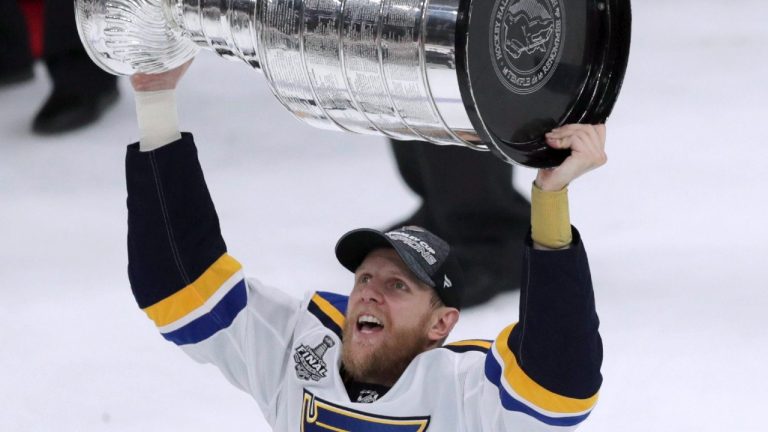 St. Louis Blues' Carl Gunnarsson, of Sweden, carries the Stanley Cup after the Blues defeated the Boston Bruins in Game 7 of the NHL Stanley Cup Final, Wednesday, June 12, 2019, in Boston. (Charles Krupa/AP)