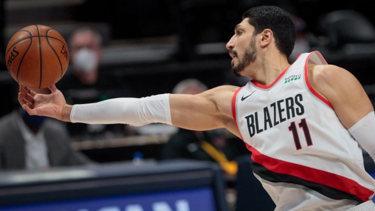 Portland Trail Blazers center Enes Kanter (11) pulls in a rebound against the Denver Nuggets in the first quarter of Game 2 of a first-round NBA basketball playoff series Monday, May 24, 2021, in Denver. (Joe Mahoney/AP)