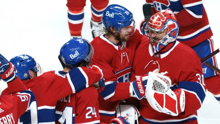 Montreal Canadiens' Eric Staal (21) celebrates the team's win with goaltender Carey Price after overtime game 6 NHL Stanley Cup playoff hockey semifinal action against the Vegas Golden Knights, in Montreal, Thursday, June 24, 2021. (Paul Chiasson/CP)