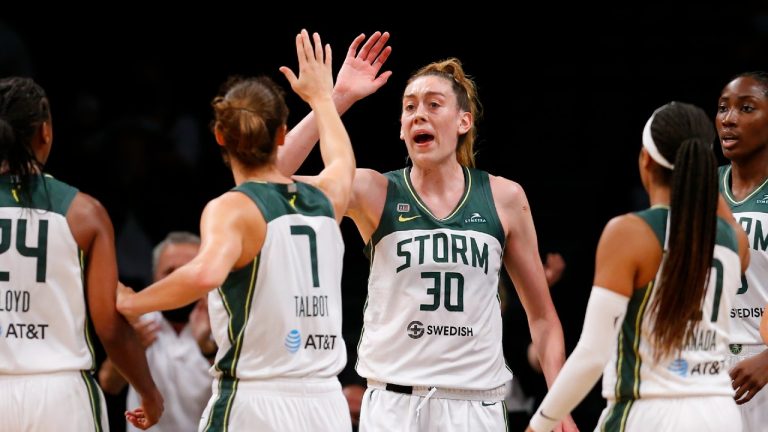 Seattle Storm forwards Stephanie Talbot (7) and Breanna Stewart (30) celebrate after a score against the New York Liberty during the second half of a WNBA basketball game Friday, Aug. 20, 2021, in New York. (Noah K. Murray/AP)